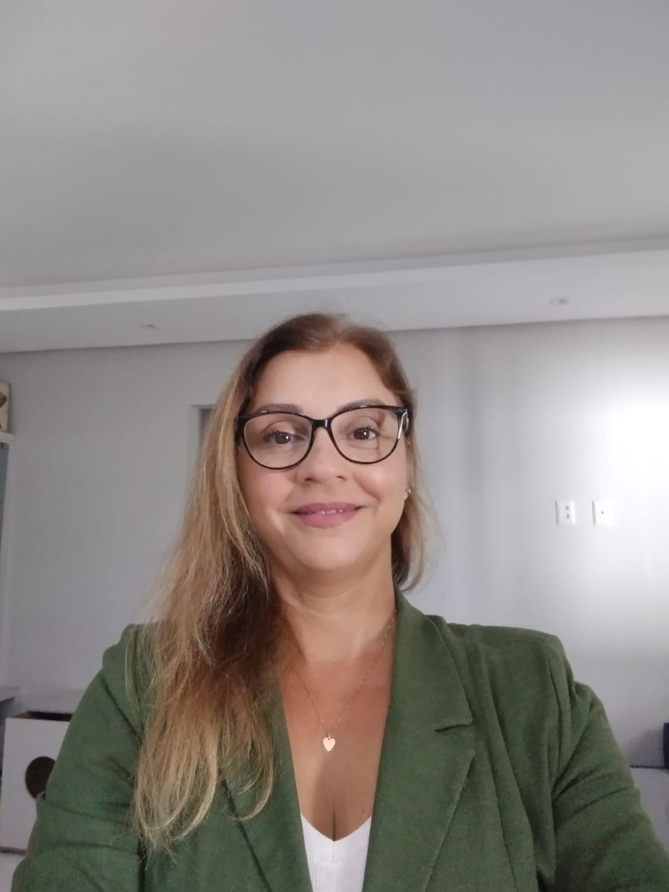 Retrato profissional de Rita de Cássia Silva, consultora de recrutamento e seleção
